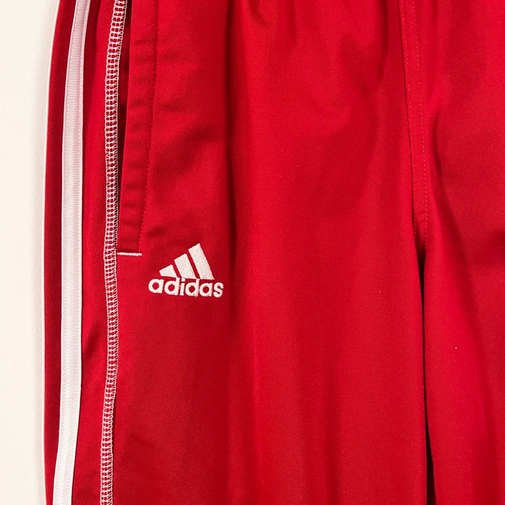 Adidas Red Sweatpants with White Stripes and Zippers